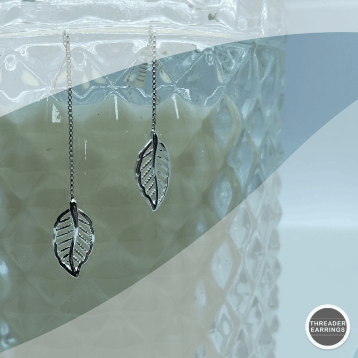 Sterling silver leaf threader earrings - hanging view