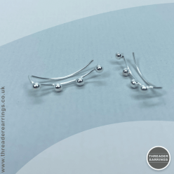 Sterling silver four ball ear climbers