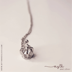 Sterling silver crown pendant