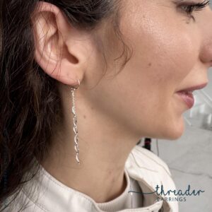 Silver spiral and chain earrings