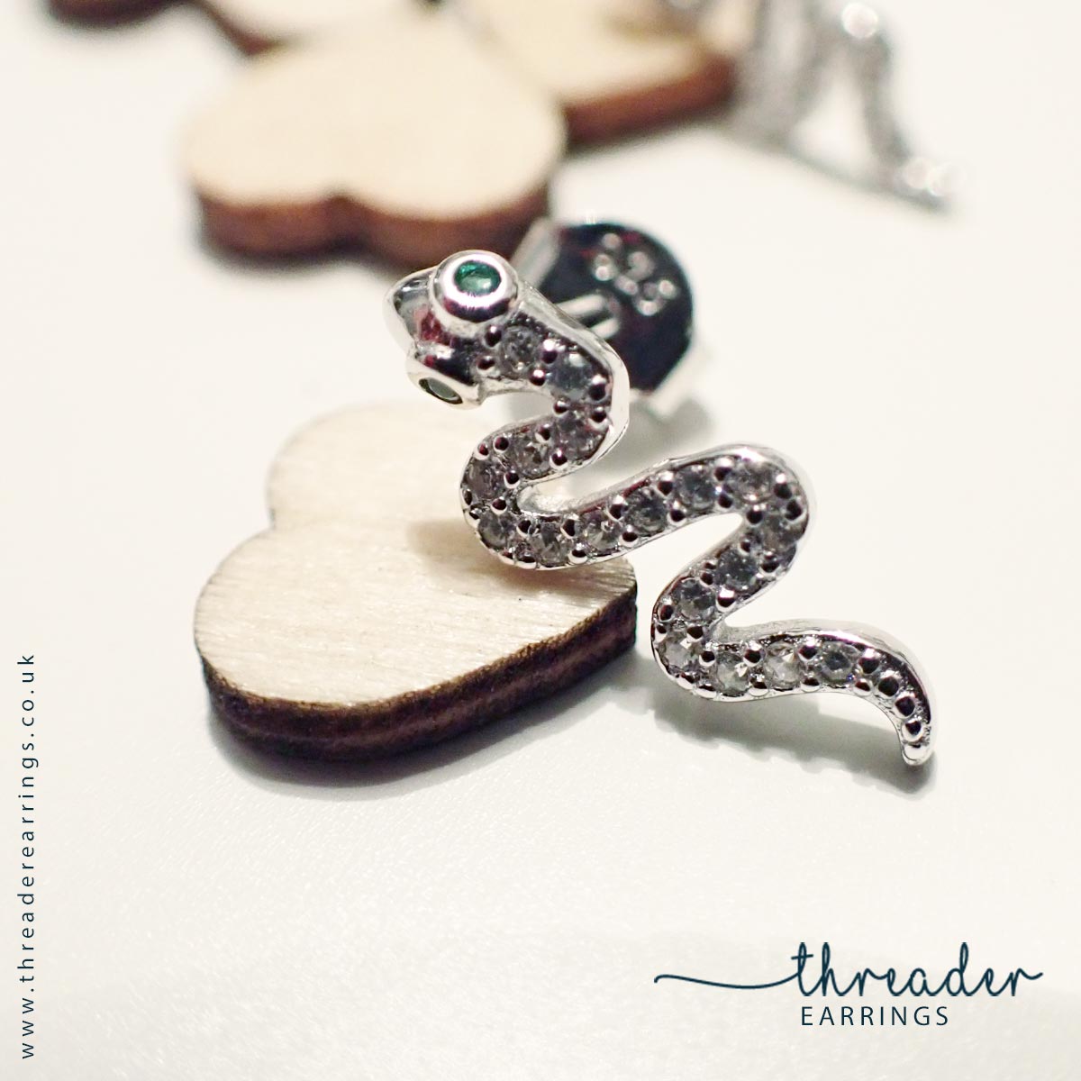 Sterling silver snake stud earrings