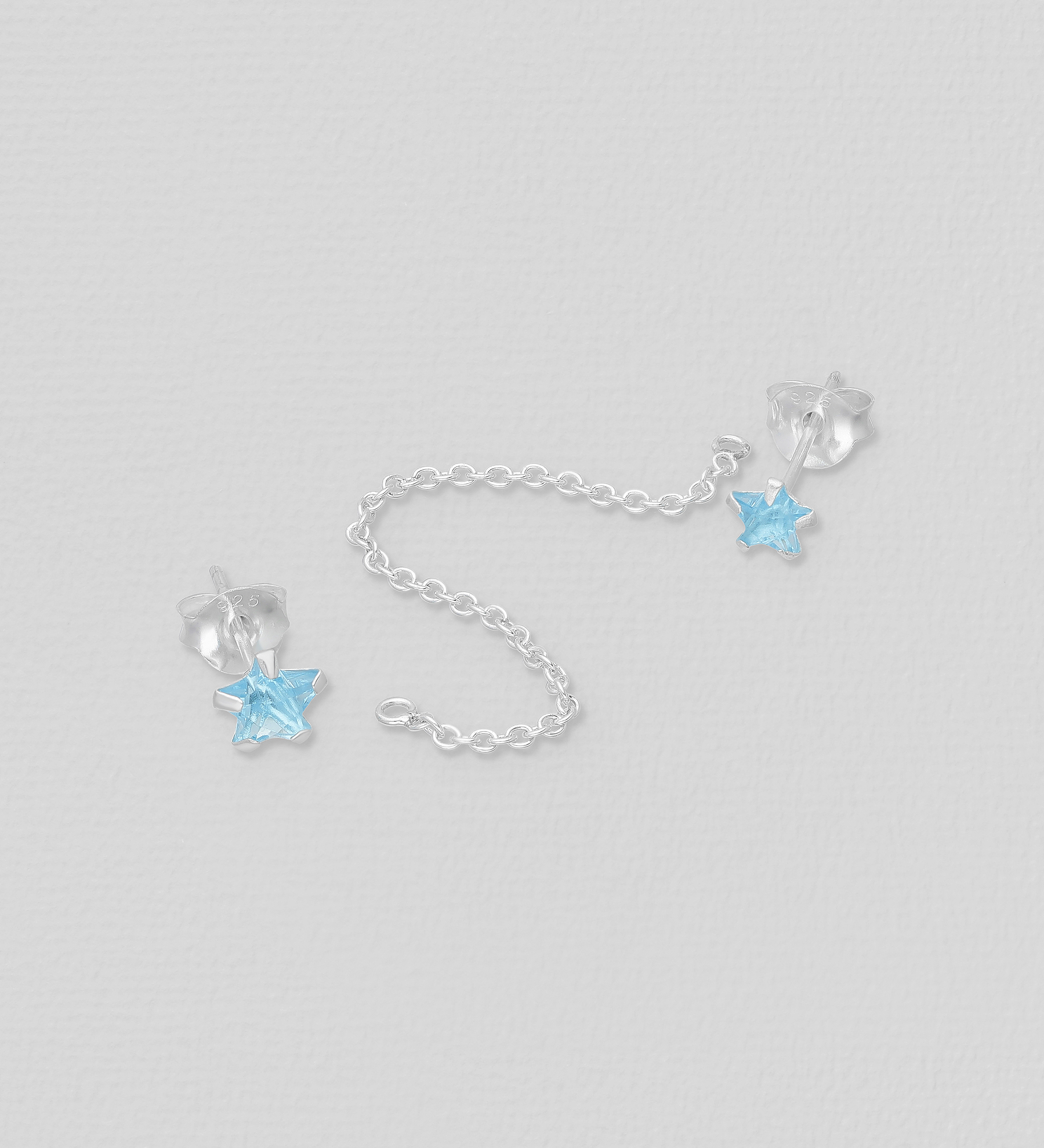 silver double piercing earrings with stars / cubic zirconia