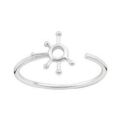 Atomic adjustable sterling silver ring with an open sunburst design on a white background