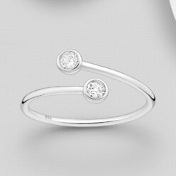 Pop adjustable sterling silver wrap ring with two round bezel-set stones against a grey background
