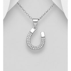 Sterling silver horseshoe pendant set with cubic zirconia, shown on a chain against a grey background