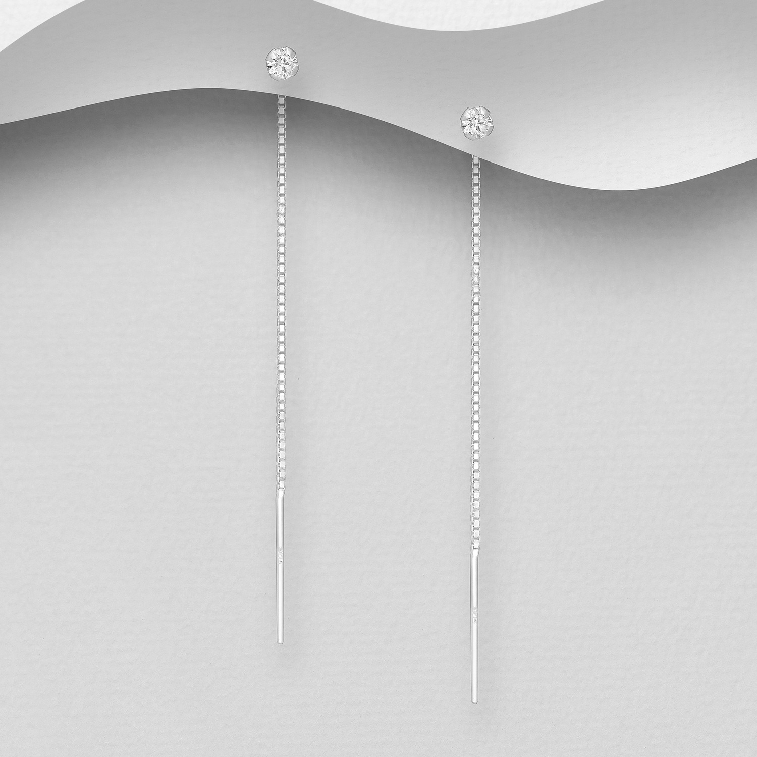 Sterling silver dangly threaders with Cubic Zirconia, on a grey display card