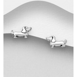 Sterling silver dog stud earrings, on a grey display card