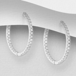 Sterling silver hoops with cubic zirconia, on a grey display card