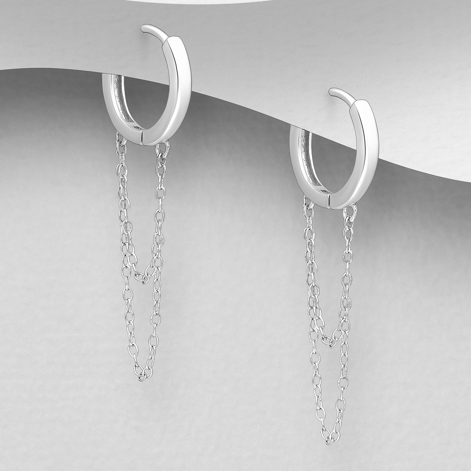Sterling silver layered chain hoop earrings (1.43cm), on a grey display card