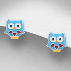Sterling silver blue enamel owl stud earrings with red heart details on a grey display card