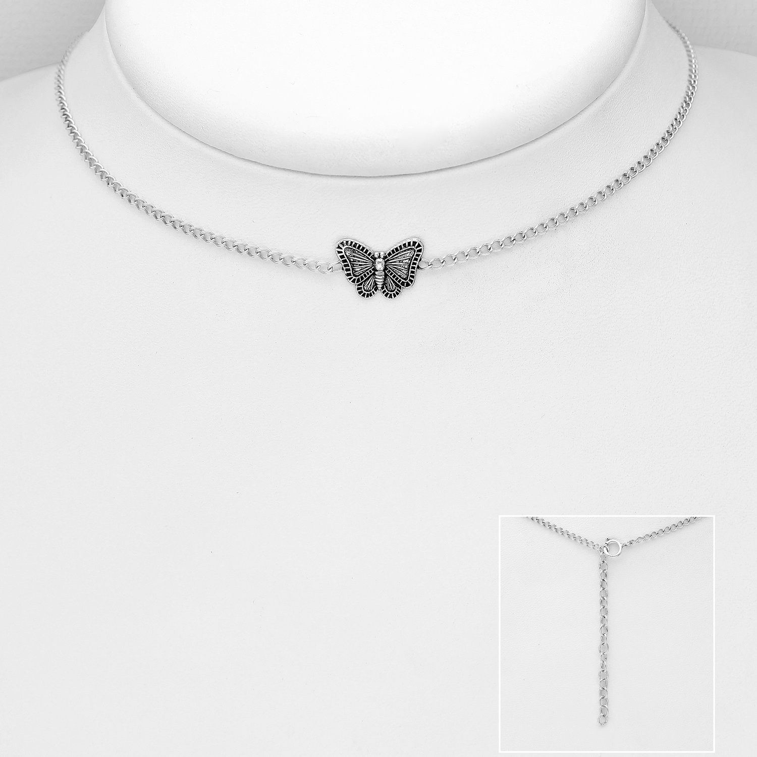 Sterling silver oxidised butterfly choker on a white display bust, with an inset showing the adjustable chain