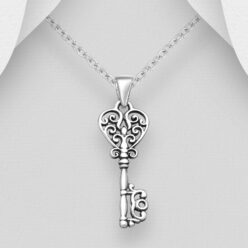 Sterling silver oxidised key pendant shown on a chain against a grey background
