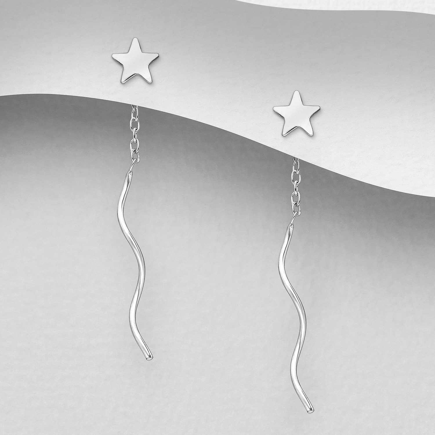 Sterling silver star pull-through earrings with twisted posts