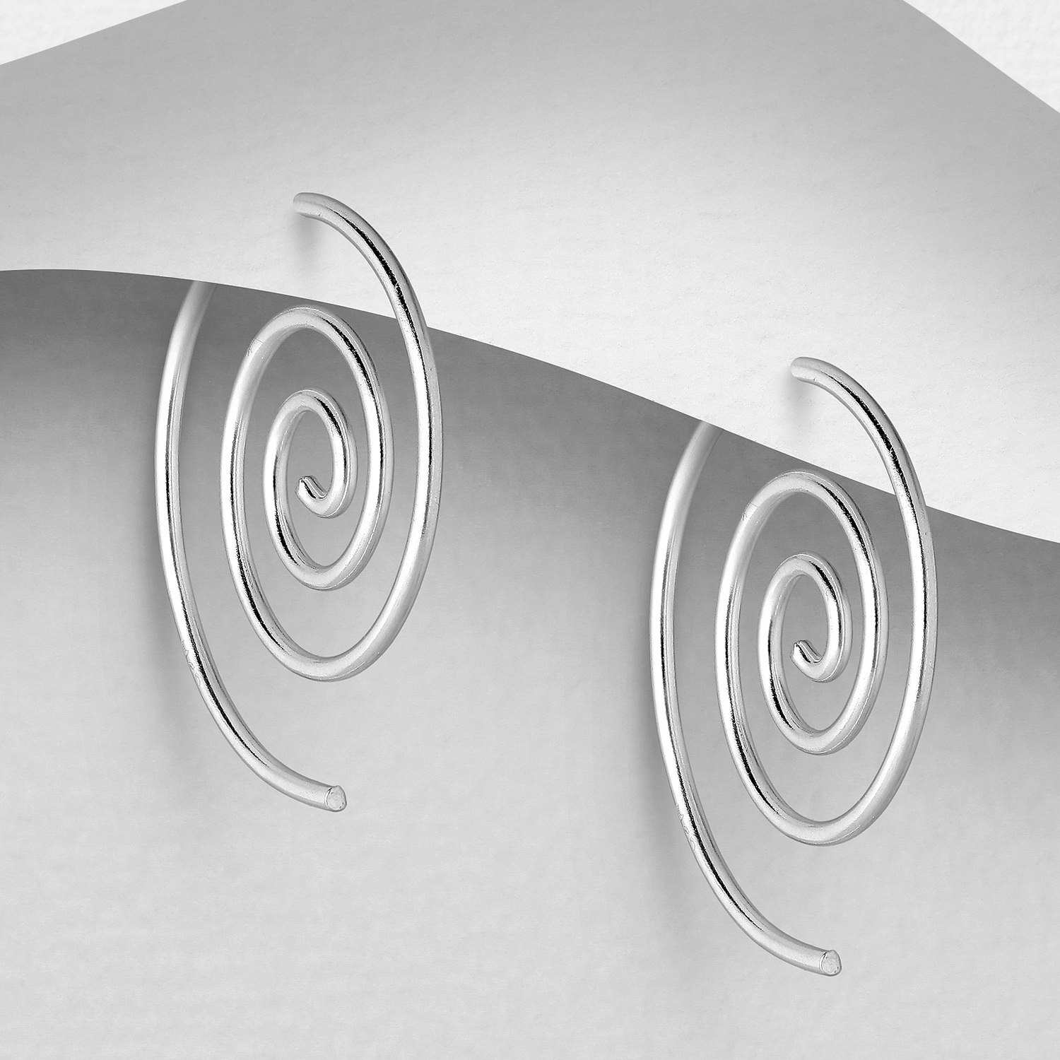 Sterling silver Spiral Hook Earrings (1.83cm x 1.98cm), on a grey display card