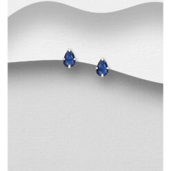 Sterling silver teardrop stud earrings with dark blue cubic zirconia on a grey display card