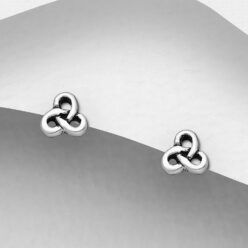 Sterling silver tiny oxidised celtic stud earrings, on a grey display card